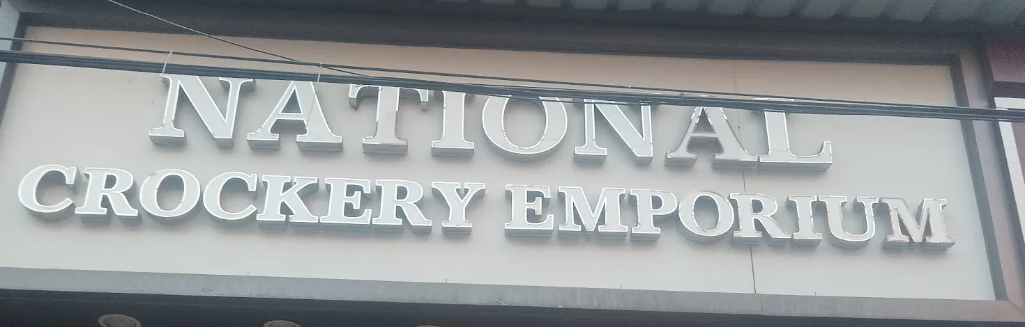 The National Crockery Emporium sign above the shop in Central Market